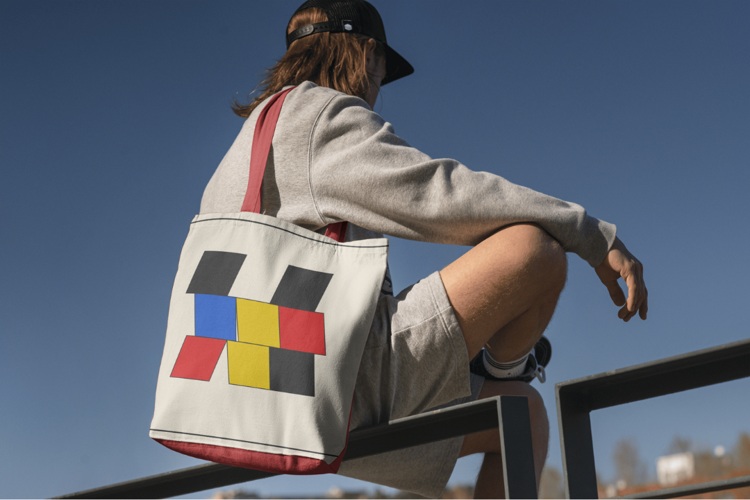 Deconstructed Stage tote bag — applied composition